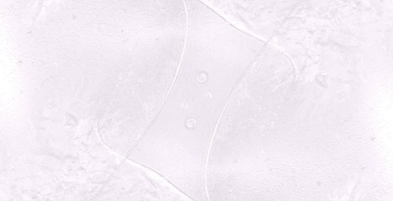 Abstract textured surface with soft lighting.
