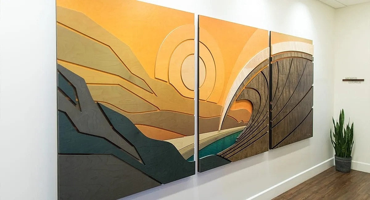 Abstract landscape wood mural in warm colors.
