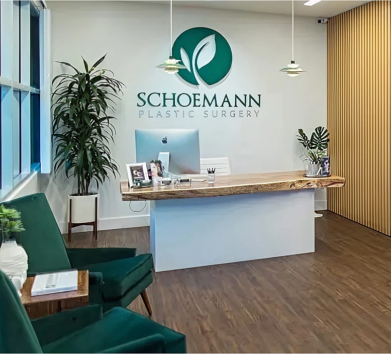 Modern plastic surgery clinic reception area.