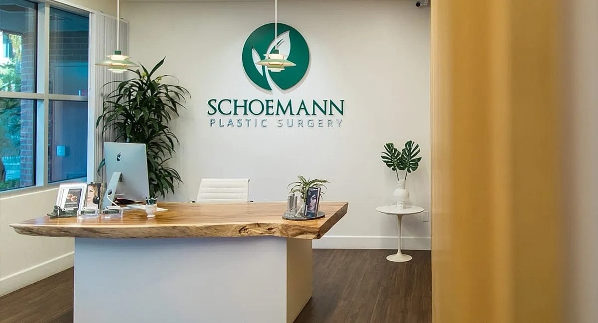 Modern plastic surgery office reception area.
