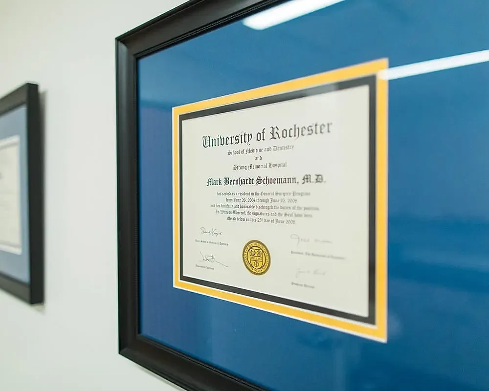 Framed University of Rochester medical diploma.