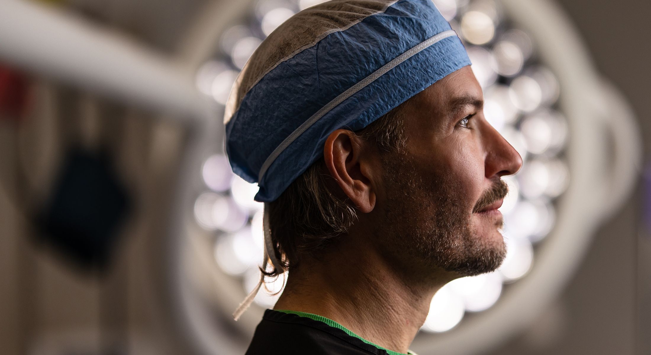 Surgeon preparing for a medical procedure.