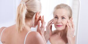 Admiring Patient with Blepharoplasty and Facelift Procedures
